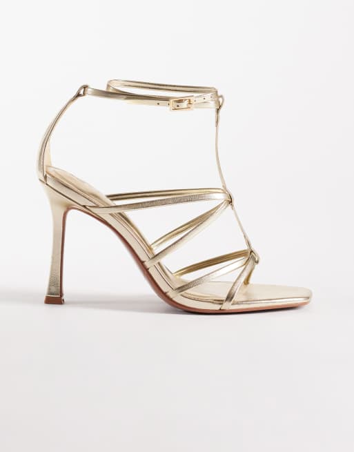 ASOS DESIGN Wide Fit Natalia caged t-bar high heel sandals in gold, 2 of 5