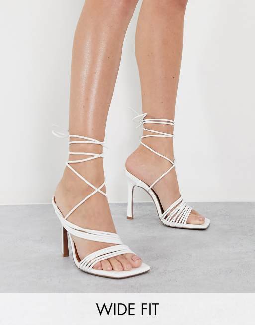 ASOS DESIGN Wide Fit Nest strappy tie leg heeled sandals in white