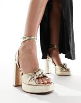 ASOS DESIGN Wide Fit Strut slingback kitten heeled shoes in black