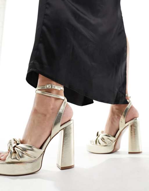 ASOS DESIGN Wide Fit Nikita knotted platform heeled sandals in gold