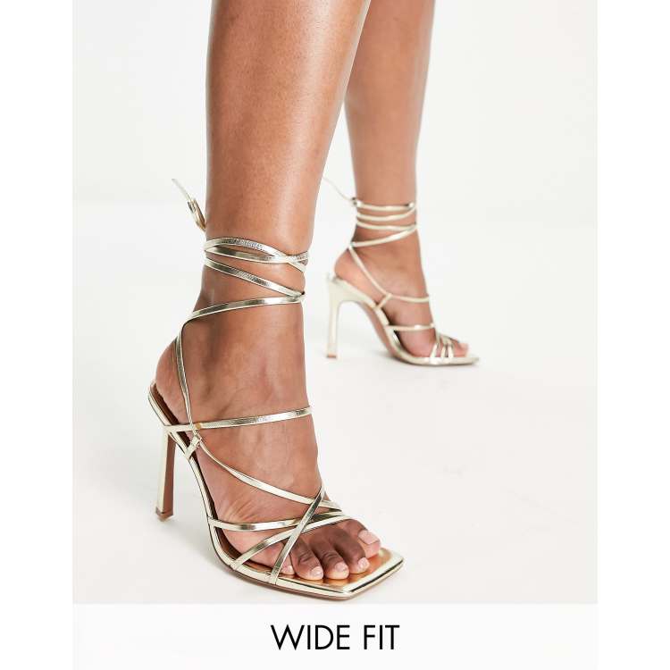 ASOS DESIGN Wide Fit Nobu strappy tie leg heeled sandals in gold