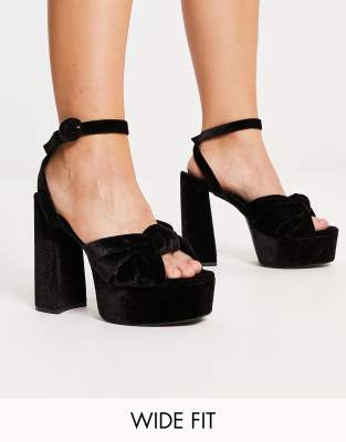 ASOS DESIGN Wide Fit - Note - Plateau-Sandalen in Schwarz mit Absatz und Zierknoten