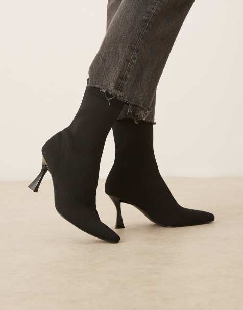 ASOS DESIGN Wide Fit Reagan chisel toe sock boots in black knit - view 1
