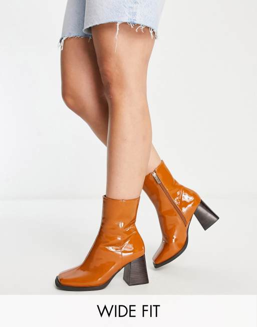 ASOS DESIGN Wide Fit Reform mid-heel boots in tan patent