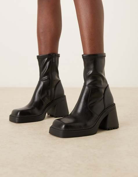 ASOS DESIGN Wide Fit Reign square toe mid-heel platform boots in black - view 1
