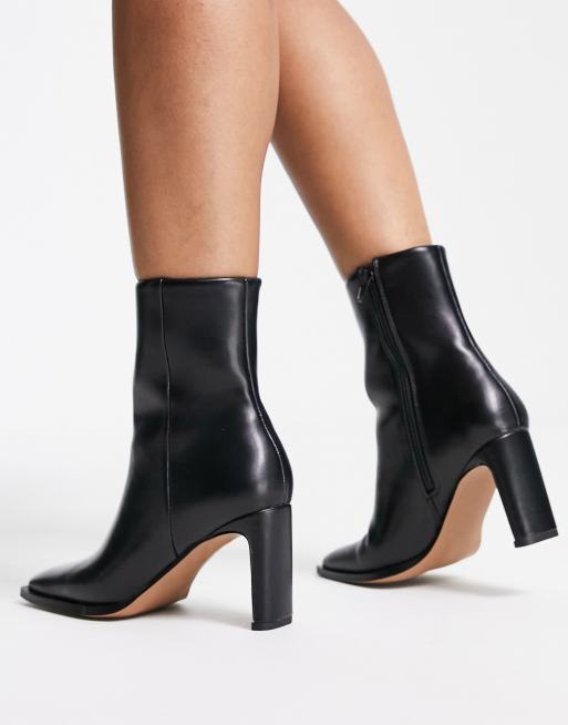 ASOS DESIGN Wide Fit Remmy set back heeled boots in black ASOS