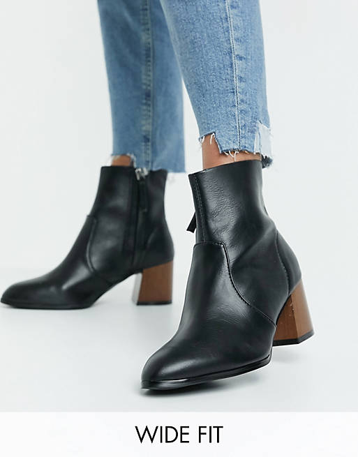 ASOS DESIGN Wide Fit Reporter heeled boots with flared wooden heel in ...
