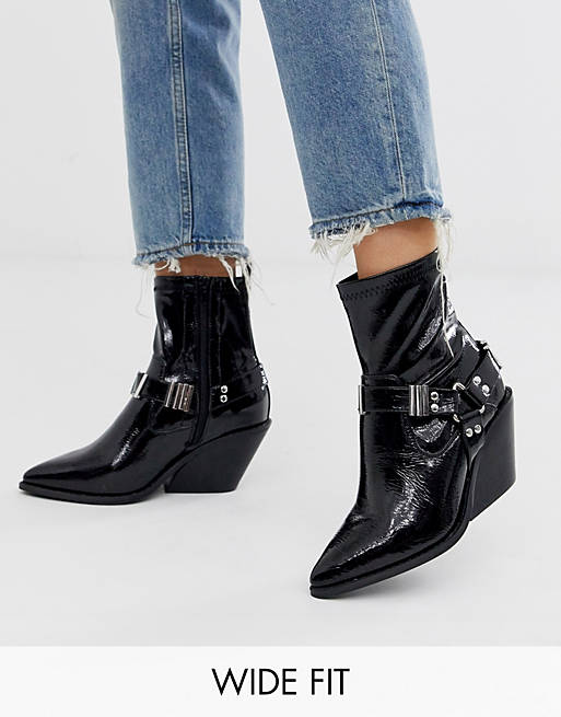 ASOS DESIGN Wide Fit Ritchie western harness sock boots in black patent