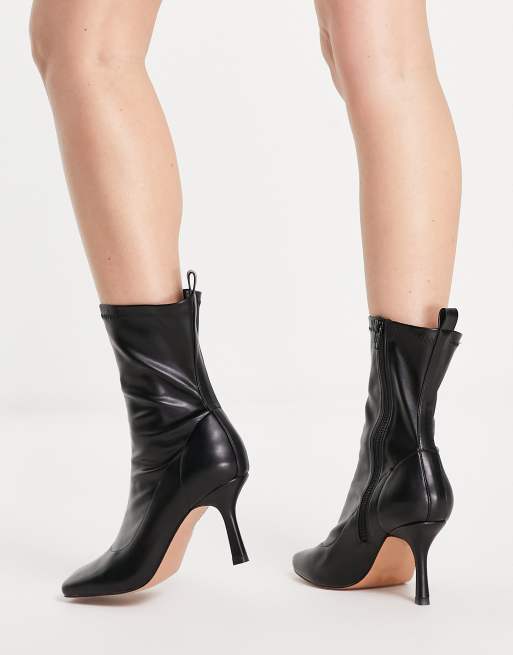 ASOS DESIGN Wide Fit Roma square toe heeled sock boots in black ASOS