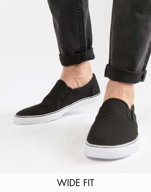 ASOS DESIGN Wide Fit slip on plimsolls in black canvas | ASOS