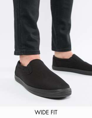 black slip on plimsolls