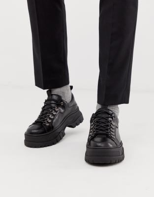 ASOS DESIGN Wide Fit sneaker shoes in black faux leather with