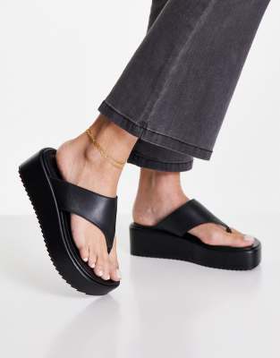 black leather flatforms