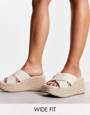 ASOS DESIGN Wide Fit Teddy 2 cross strap wedges in natural fabrication