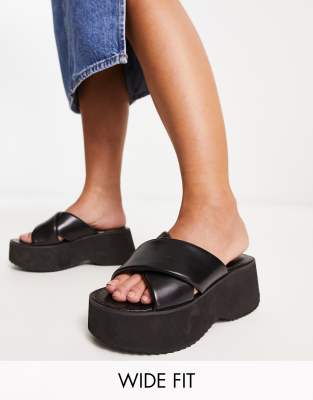 ASOS DESIGN Wide Fit ASOS DESIGN Wide Fit Tornado padded cross strap flatforms in black