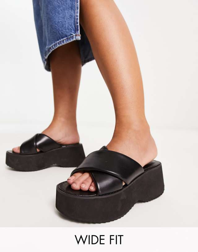 ASOS DESIGN Wide Fit Tornado padded cross strap flatforms in black