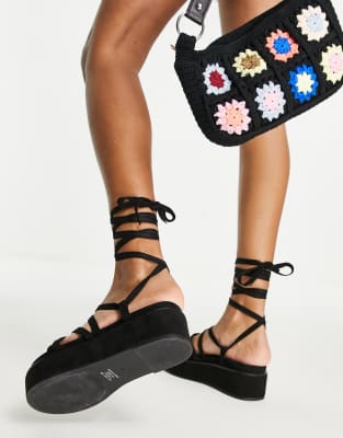 black suede flatforms