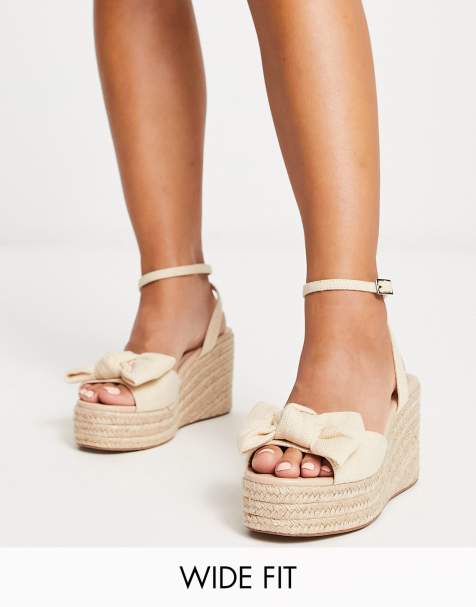 ASOS DESIGN Wide Fit Trisha bow detail espadrille wedges in natural fabrication - view 1