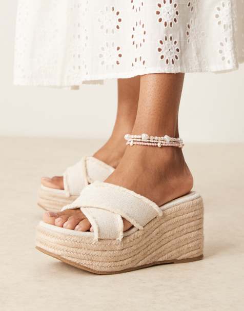 ASOS DESIGN Wide Fit – Twirl – Klapki na koturnach ze skrzyżowanymi paskami w kolorze naturalnym - view 1