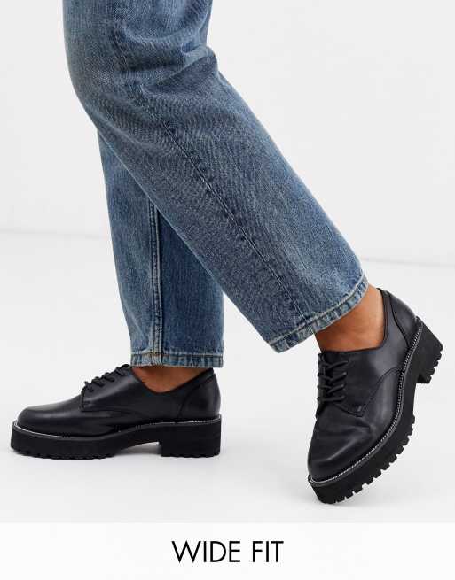 chunky lace up flat shoes in black