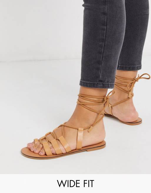 ASOS DESIGN Wide Fit Violet leather tie leg gladiator sandals in