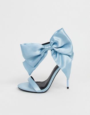 white heels with blue bow