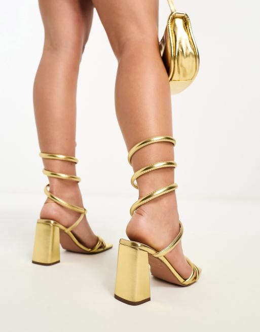 ASOS DESIGN Wide Fit Wrap ankle coil high heeled sandals in gold