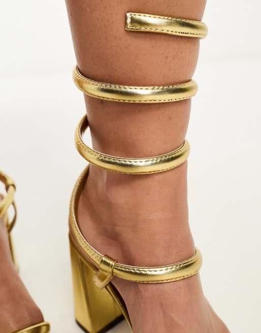 ASOS DESIGN Wide Fit Wrap ankle coil high heeled sandals in gold