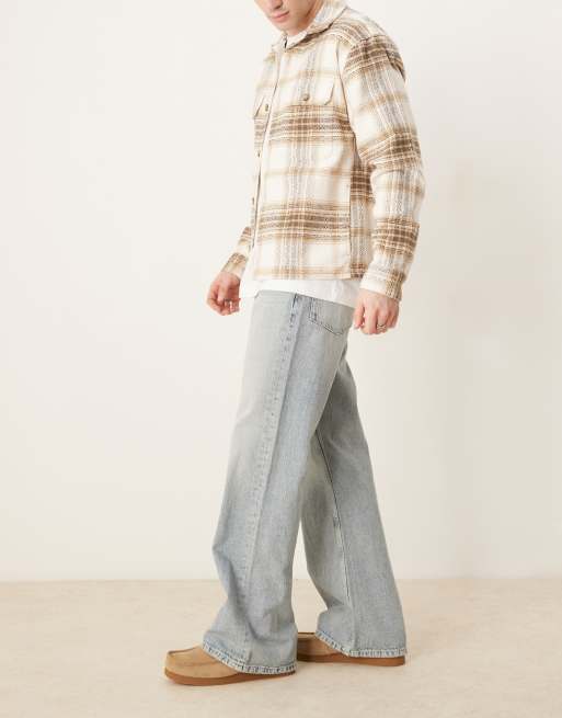 ASOS DESIGN wide flare jeans in bleached wash