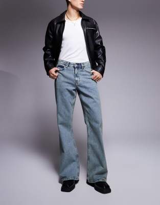 Asos Design Wide Flare Jeans In Light Blue Vintage Tint