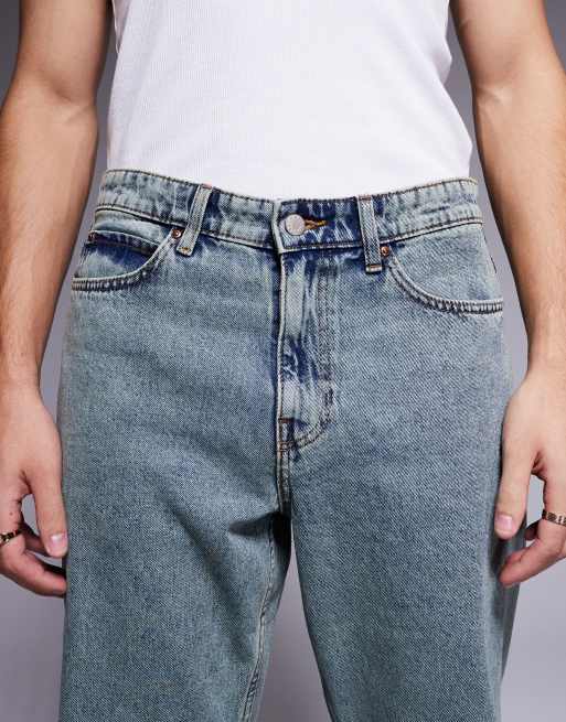 ASOS DESIGN wide flare jeans in light blue vintage tint