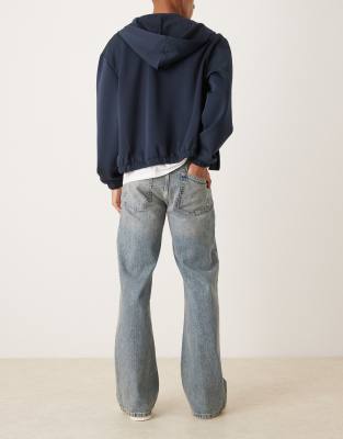 Asos Design Wide Flare Jeans In Blue