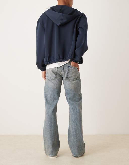 ASOS DESIGN wide flare jeans in light wash blue with tint