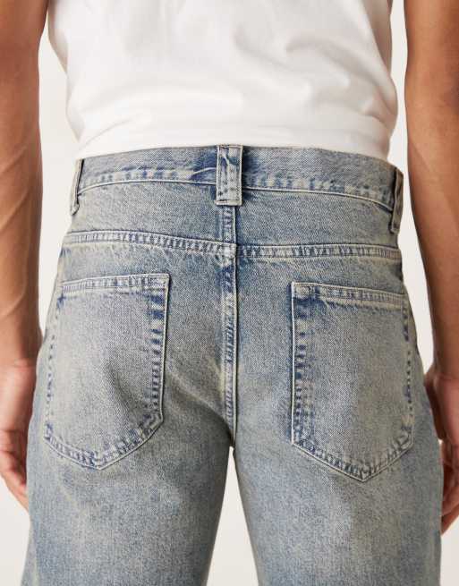 ASOS DESIGN wide flare jeans in light wash blue with tint