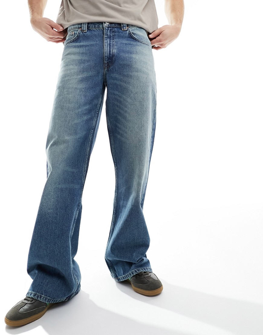 Asos Design Flare Jeans In Light Wash-blue