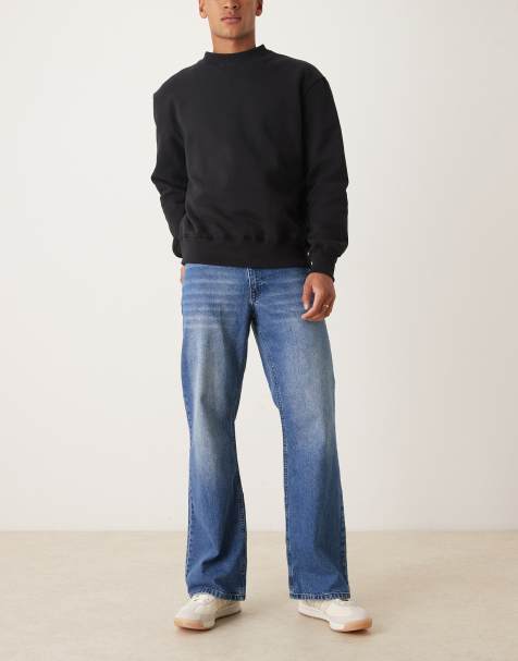 ASOS DESIGN wide flare jeans in mid wash blue - view 1