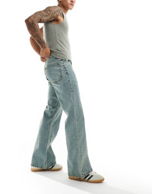 Asos Design Wide Flare Jeans In Vintage Tint Light Blue