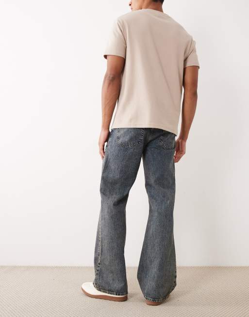 ASOS DESIGN wide flare jeans in vintage wash blue, 3 of 5