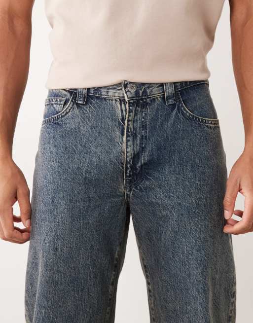 ASOS DESIGN wide flare jeans in vintage wash blue, 4 of 5