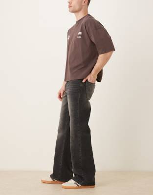 Asos Design Wide Flare Jeans In Black