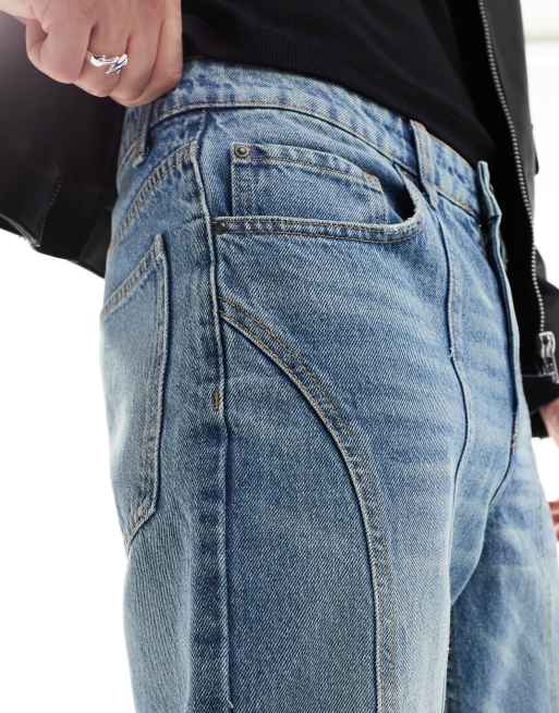 ASOS DESIGN wide flare jeans with paneling detail in mid wash blue, 3 of 5