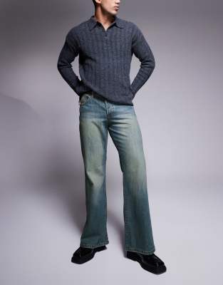 wide flare jeans with seam detail in mid wash blue