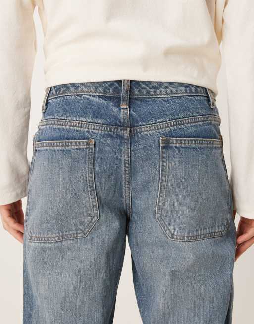 ASOS DESIGN wide flare jeans with seam detail in mid wash blue, 4 of 5