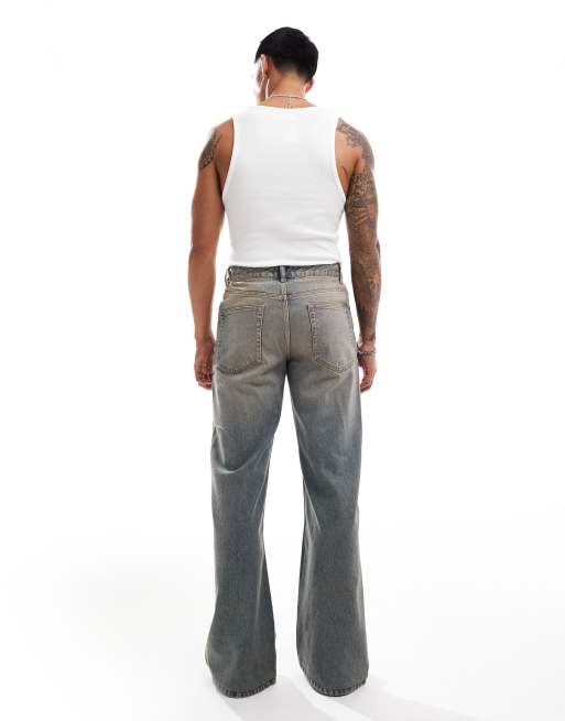ASOS DESIGN wide flare jeans in mid wash blue with tint