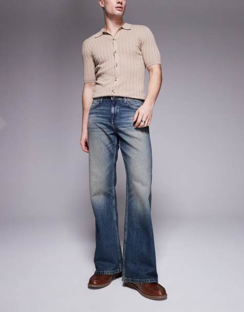 ASOS DESIGN wide flare jeans with tint in mid wash blue - view 1