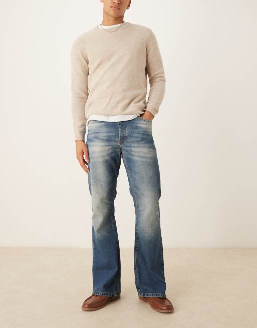 ASOS DESIGN wide flare jeans with tint in mid wash blue