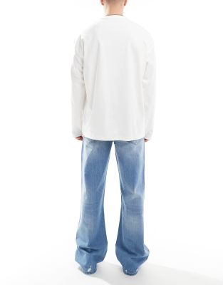Asos Design Wide Flare Jeans With Tint & Rips In Blue