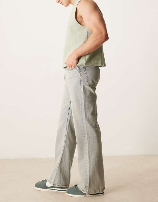 ASOS DESIGN wide flare jeans with vintage tint in light wash blue