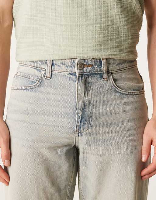 ASOS DESIGN wide flare jeans with vintage tint in light wash blue