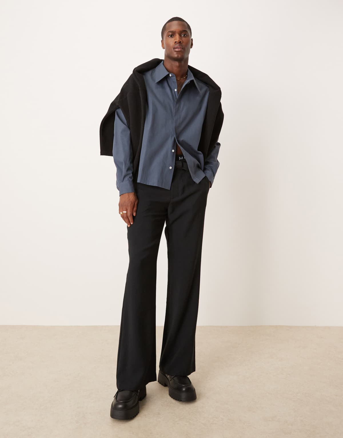 ASOS DESIGN wide flare smart trousers with belt in black